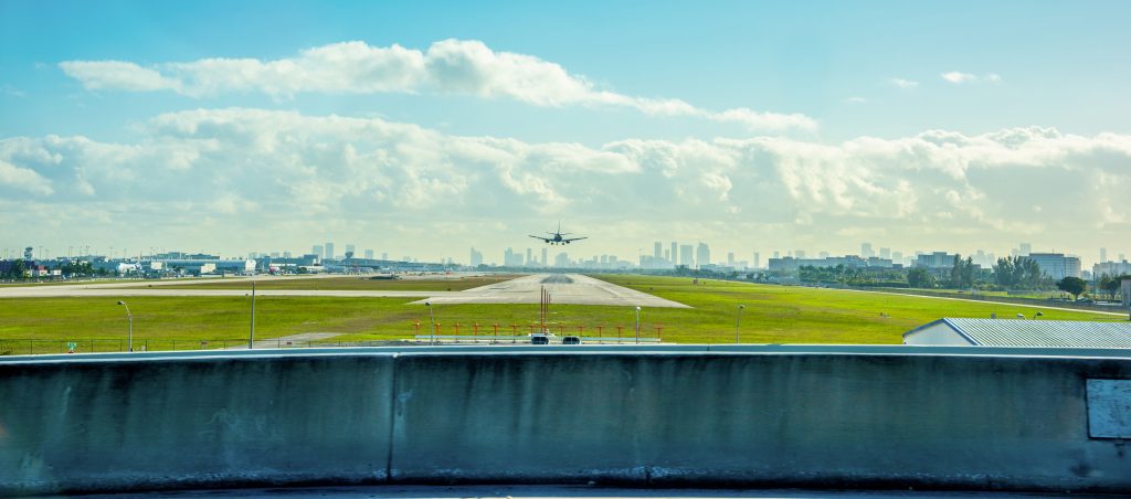 A jet airplane touches down at Fort Lauderdale International Airport in Southern Florida, US.