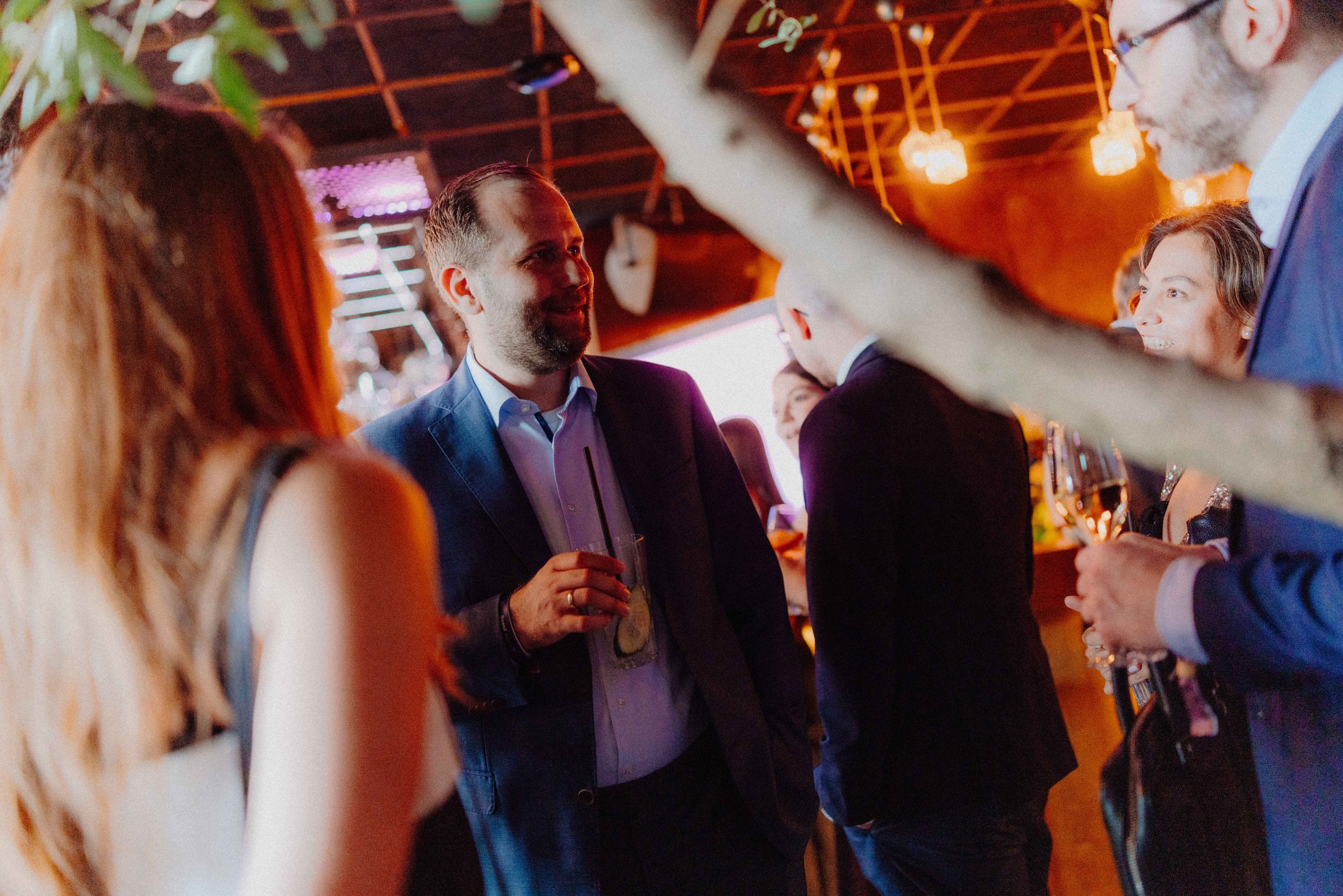 Guests engaging in conversations during the reception