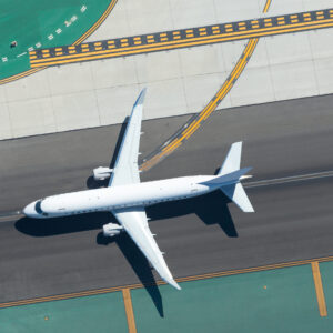 shutterstock_1597942963_NOLOGO_Square EJet on runway ready to take off